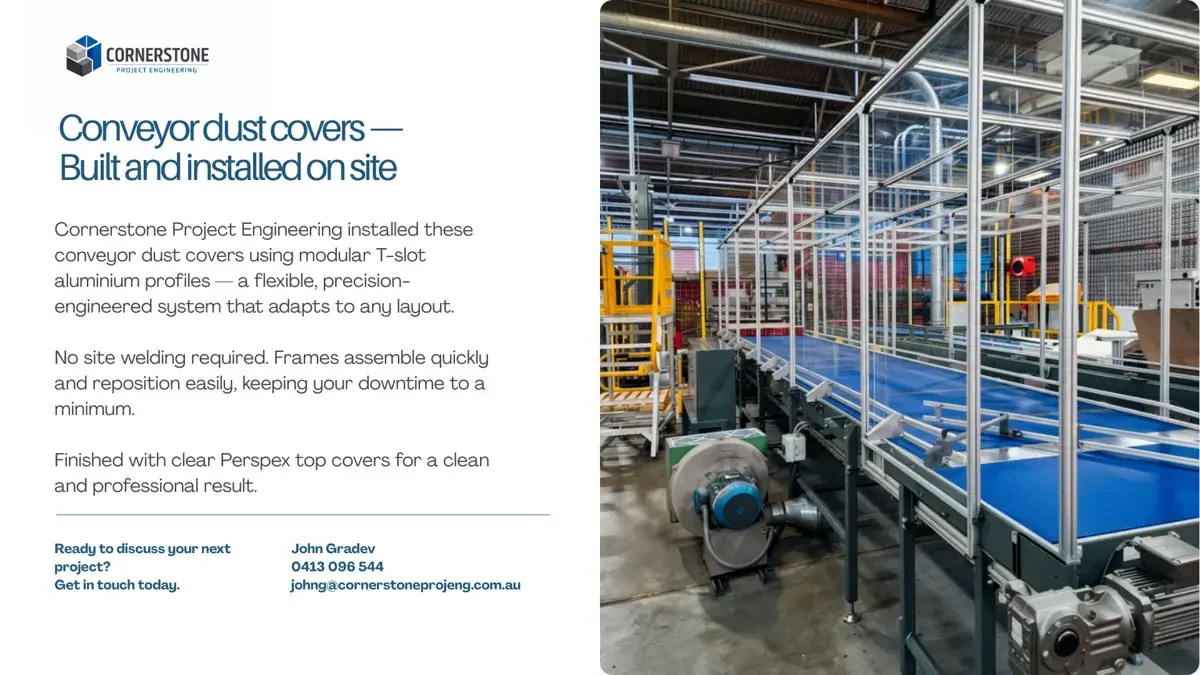 Conveyor dust-cover enclosure with aluminium framing and clear panels over a blue industrial conveyor